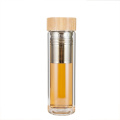 Botella de agua de cristal respetuosa del medio ambiente del infusor de la fruta del deporte de la pared doble con la tapa de bambú